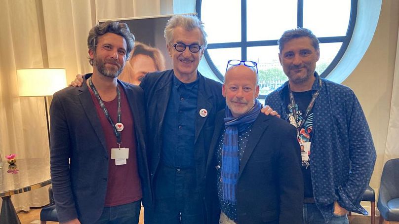 David Mouriquand, Fred Ponsard et Bruno Maggiore avec le grand Wim Wenders (deuxième en partant de la gauche)