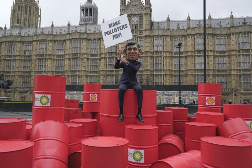 Manifestations à « grosse tête » de Rishi Sunak d'Oxfam devant le Parlement à Londres, septembre 2023