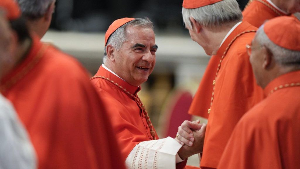 Cardinal Angelo Becciu attends a consistory inside St. Peter