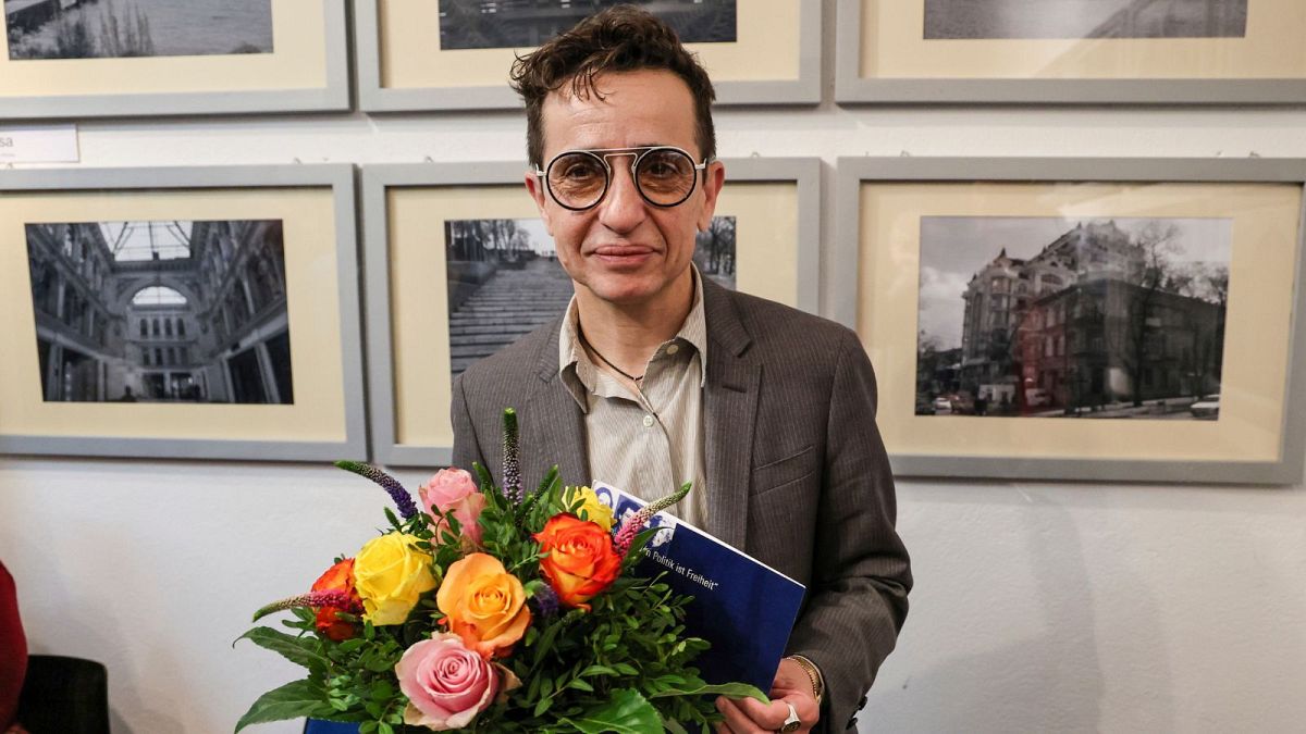 Russian American writer Masha Gessen poses for a photo after receiving the Hannah Arendt Prize.