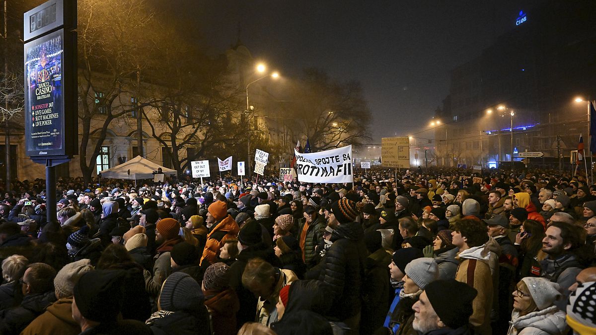 People take part in a protest against scrapping the special prosecutor