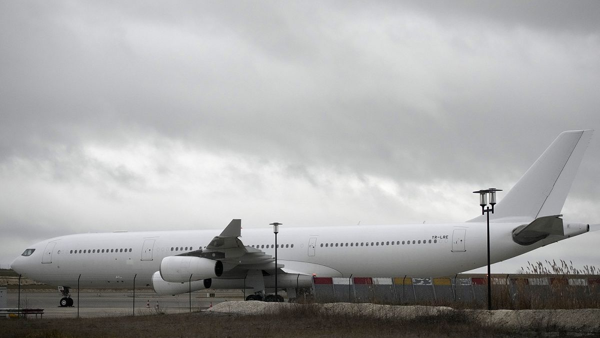 The plane reported to carry some 300 Indian citizens parks at the Vatry airport, eastern France, 23 December 2023