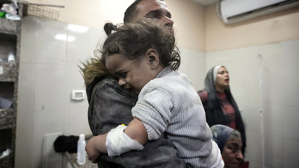 Palestinians wounded in the Israeli bombardment of the Gaza Strip receive treatment at the Nasser hospital in Khan Younis, Southern Gaza Strip, Sunday, Dec. 31, 2023.