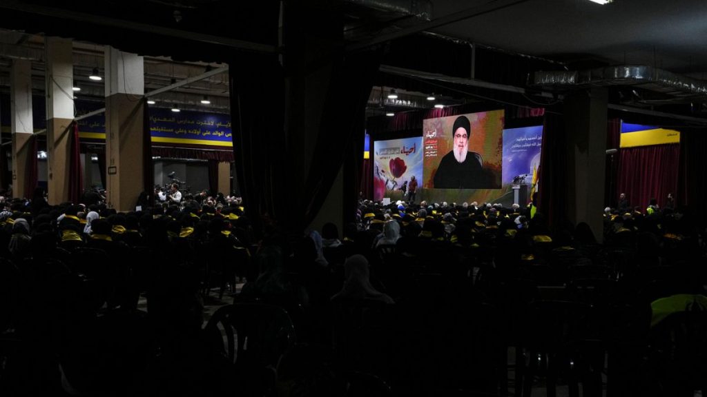 Supporters of the Iranian-backed Hezbollah group listen to a speech by Hezbollah leader Sayyed Hassan Nasrallah, Lebanon, Saturday, Nov. 11, 2023.