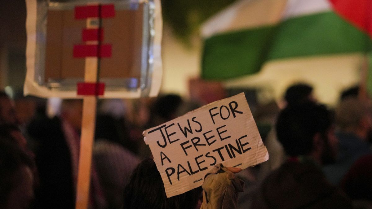Demonstrators march during a pro-Palestinian protest, Saturday, Oct. 14, 2023, in Cincinnati.
