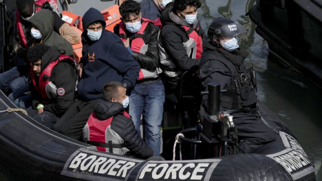 People thought to be migrants who undertook the crossing from France picked up in the Channel, pictured in Dover, south east England