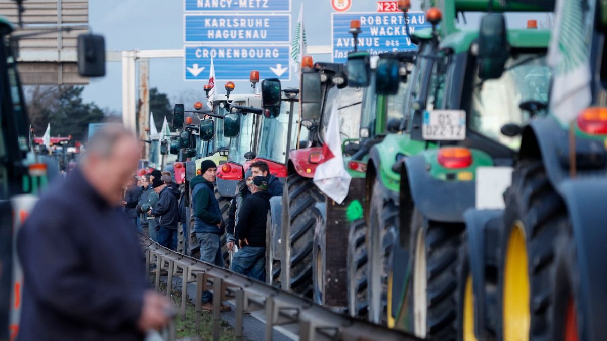 Farmers block the highway Wednesday, Jan. 24, 2024 near Strasbourg; eastern France.