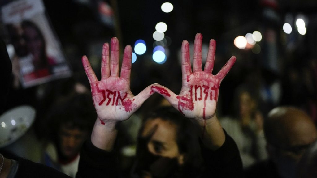 Relatives and supporters of the Israeli hostages held in the Gaza Strip by the Hamas militant group attend a protest calling for their release outside Israel