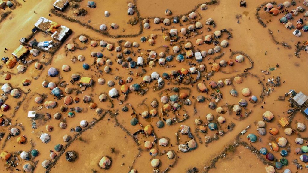 Huts made of branches and cloth provide shelter to Somalis displaced by drought on the outskirts of Dollow, Somalia, September 2022.