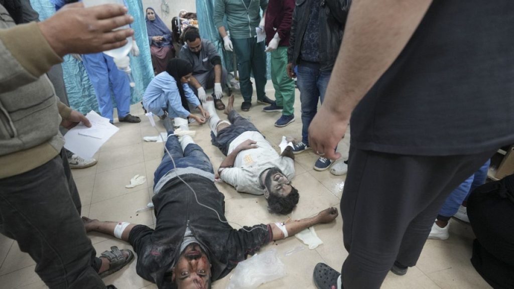 Palestinians wounded in the Israeli bombardment of the Gaza Strip are treated in a hospital in Deir al Balah on Sunday, Feb. 4, 2024.