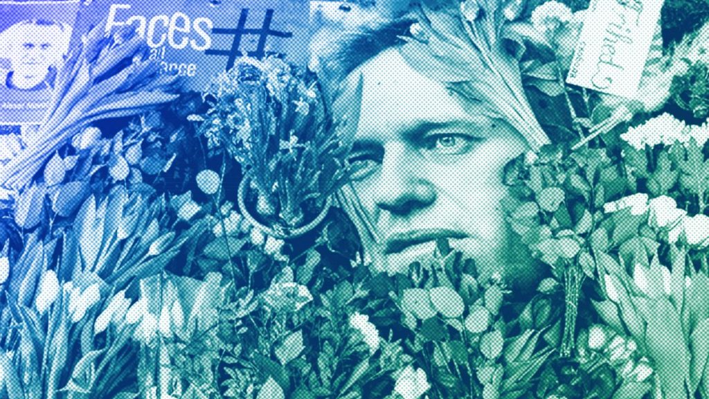 A portrait of Alexei Navalny is seen among flowers in front of the Russian embassy in Copenhagen, 17 February 2024
