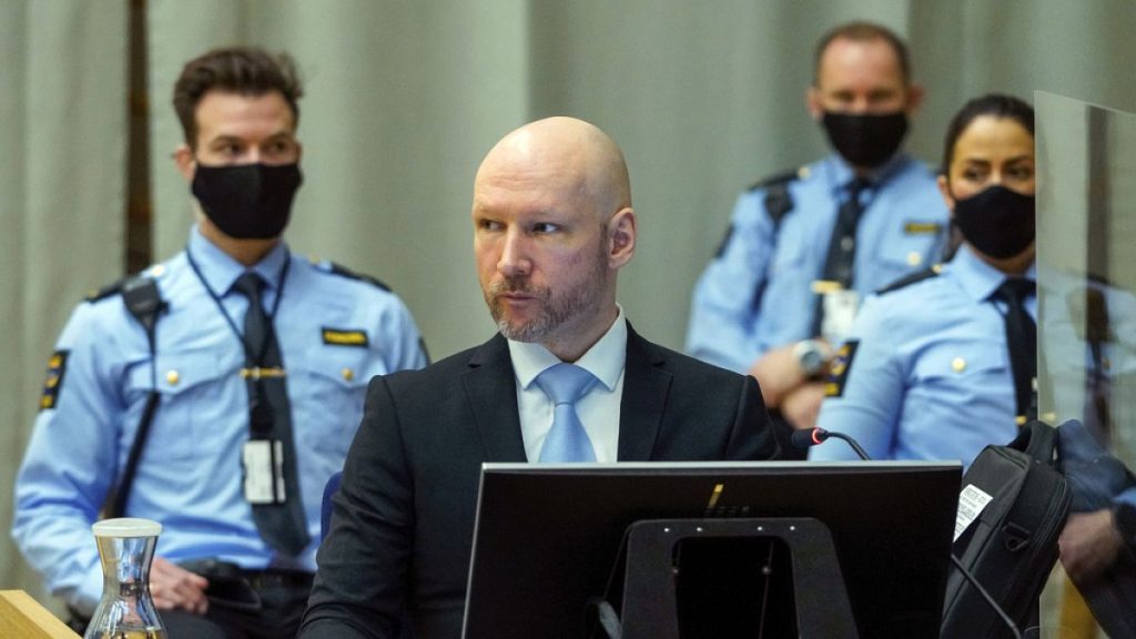 Convicted mass murderer Anders Behring Breivik sits in the makeshift courtroom in Skien, Norway, Jan. 19, 2022.