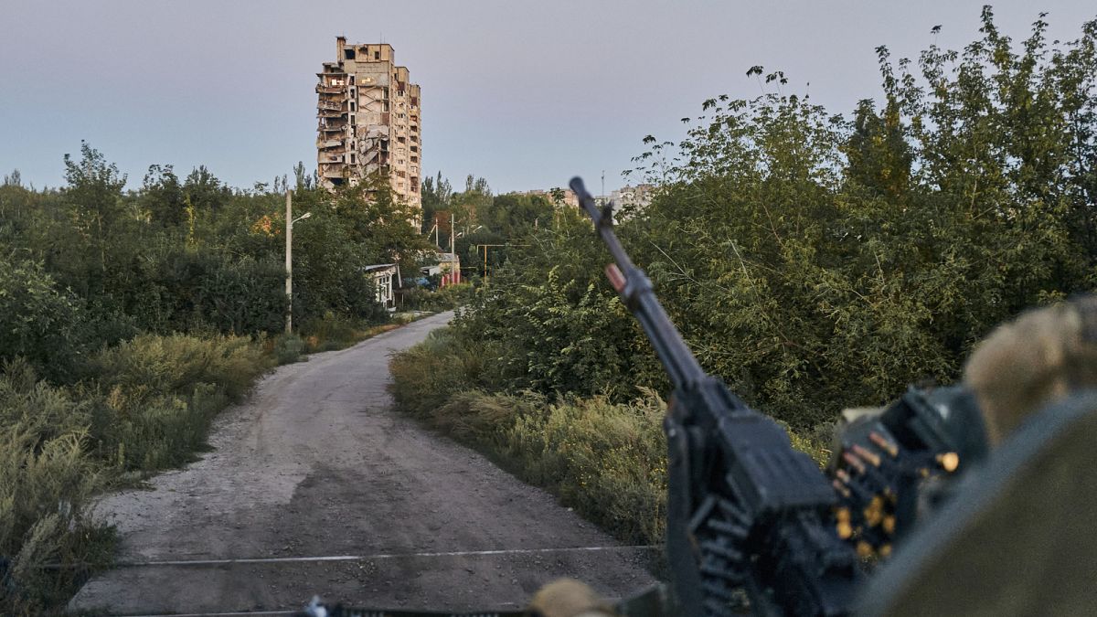 A Ukrainian soldier sits in his position in Avdiivka, Donetsk region, Ukraine, on Aug. 18, 2023.