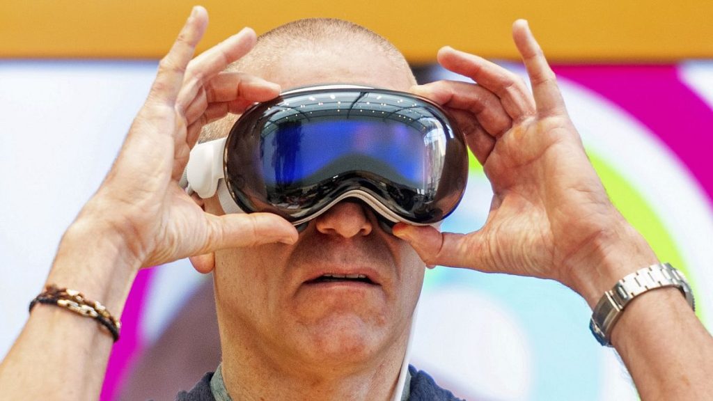 Scott Joachim tries out an Apple Vision Pro headset during the first day of sales at a Palo Alto, California, Apple store on Friday, February 2, 2024.