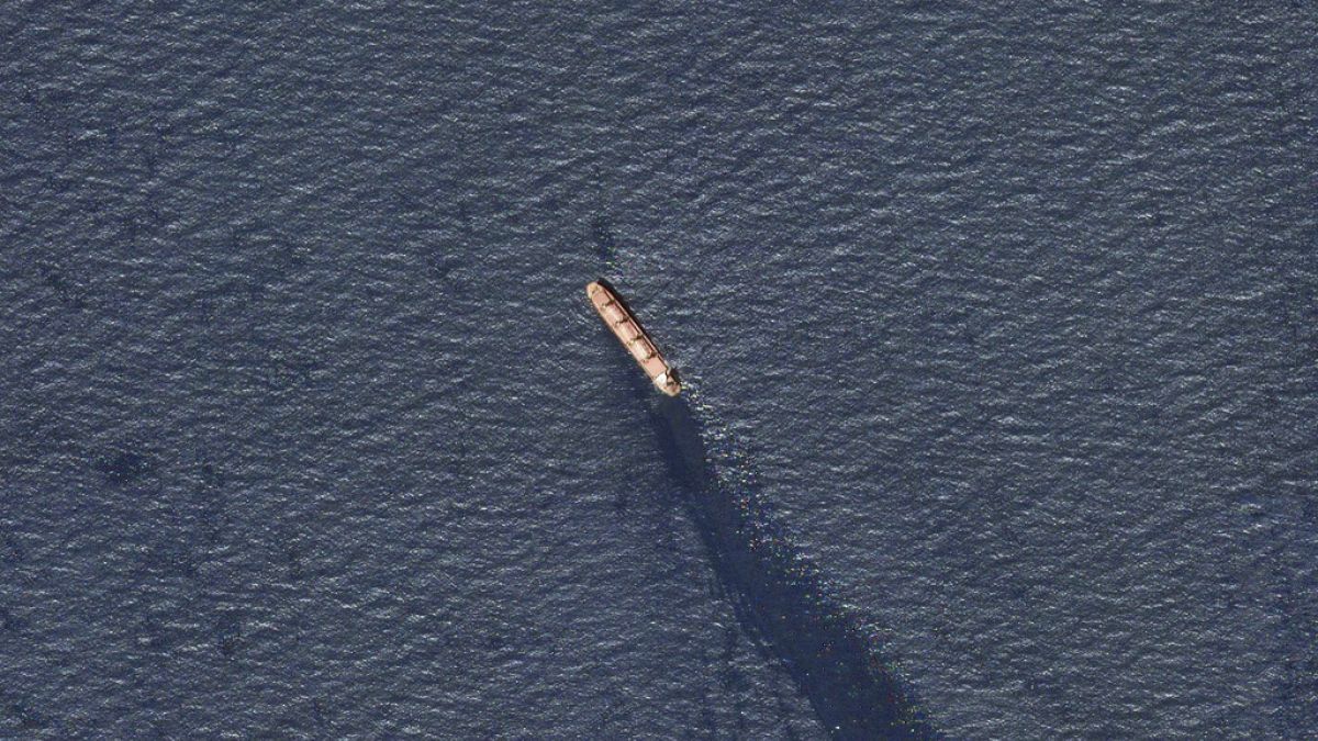 The Belize-flagged bulk carrier Rubymar is seen in the southern Red Sea near the Bay el-Mandeb Strait leaking oil after an attack by Yemen