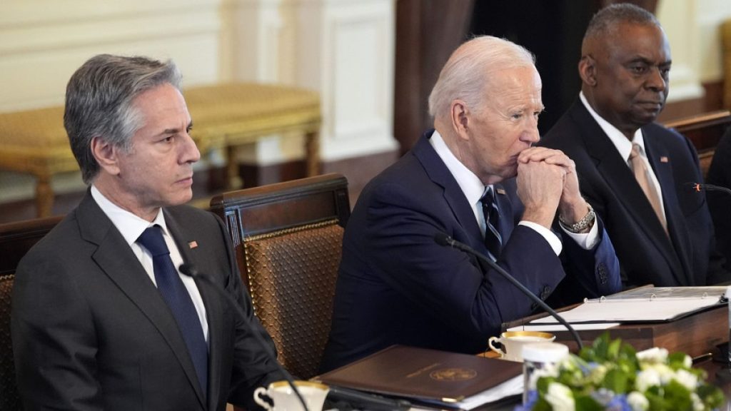 President Joe Biden listens with Secretary of State Antony Blinken and Defence Secretary Lloyd Austin as he meets with Polish President Andrzej Duda