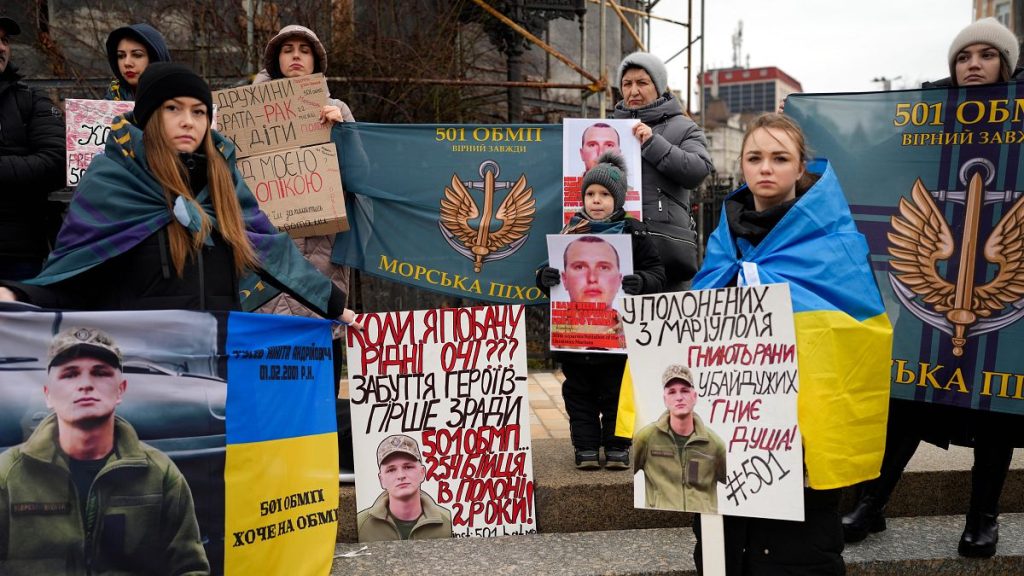 People attend a rally in Kyiv to demand the release of Ukrainian prisoners of war.