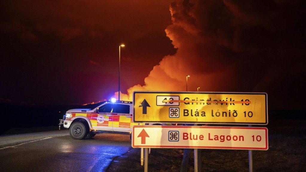 An emergency vehicle is stationed on a road leading to volcanic activity between Hagafell and Stóri-Skógfell, Iceland, on Saturday, March 16, 2024.