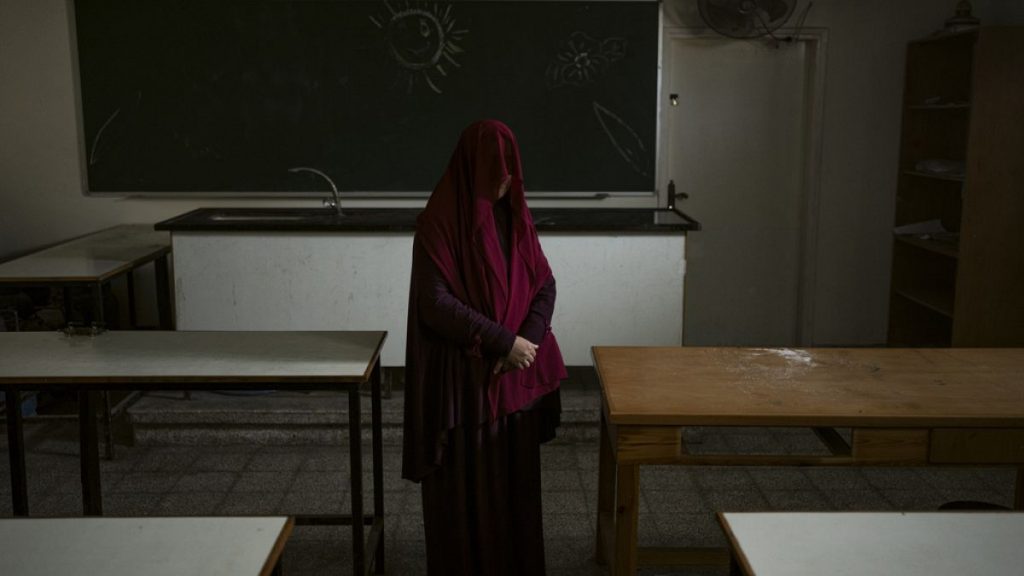 Nabela, who was detained by Israeli forces, poses for a portrait at the U.N. school where she is sheltering in Rafah, southern Gaza Strip, Friday, Feb. 23, 2024.