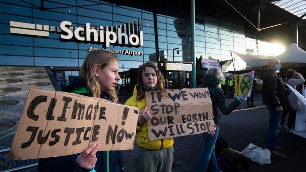 Climate activists protest outside Schiphol Airport in December 2020.