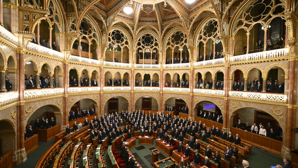 Hungarian Prime Minister Viktor Orban stand during a swearing in ceremony, Monday, Feb 26 March.