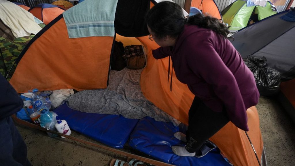 refugees in tent