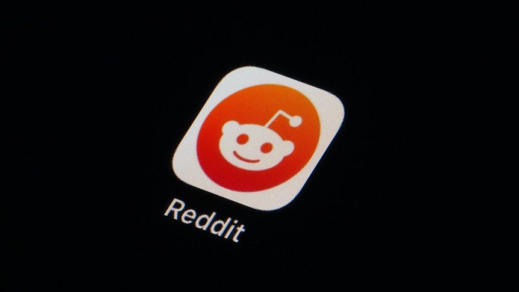 The Reddit app icon is seen on a smartphone on Feb. 28, 2023, in Marple Township, Pa. Reddit said Friday, March 15, 2024,