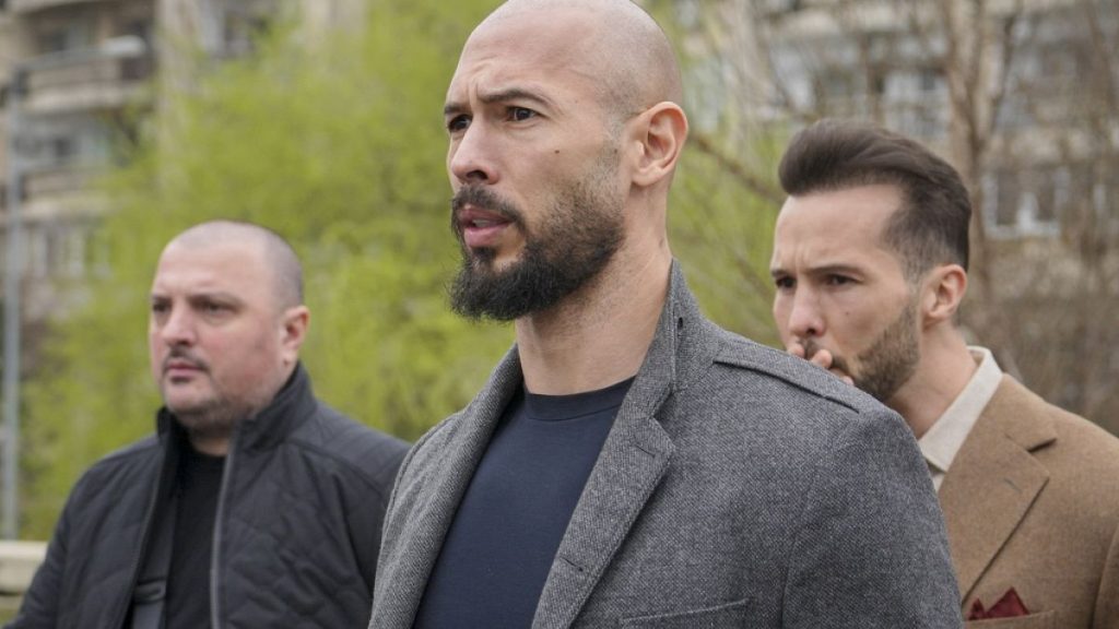 Andrew Tate, center, and his brother Tristan leave the tribunal in Bucharest in late February