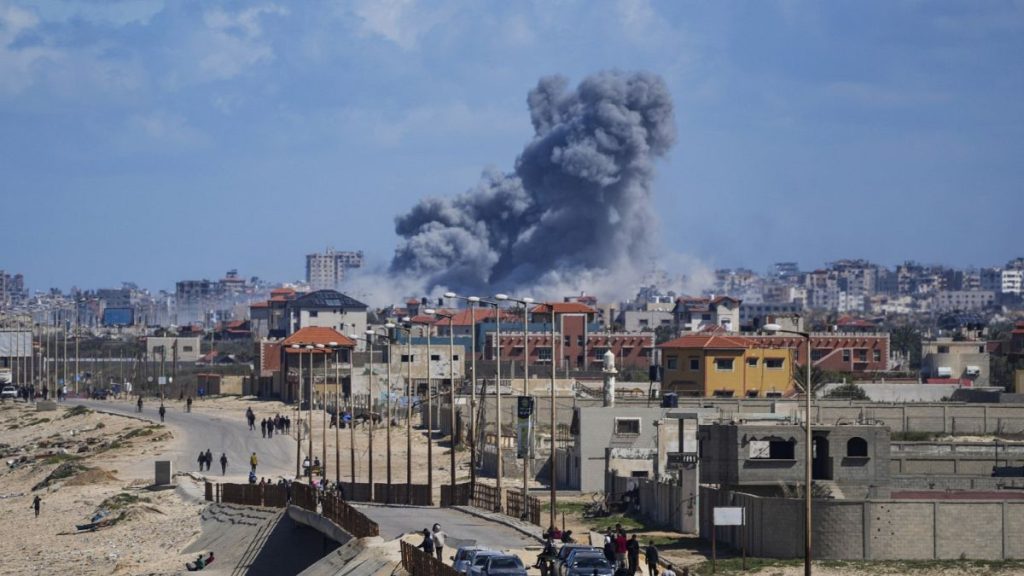 Smoke rises following an Israeli airstrike in the central Gaza Strip in mid-March