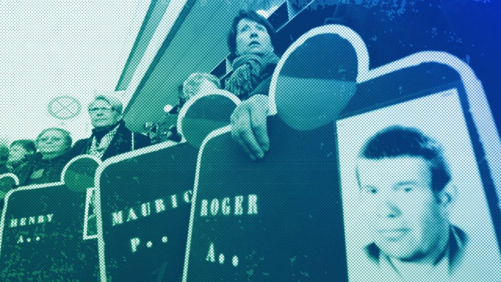 Relatives of victims show photos of their deceased loved ones during a case for asbestos plant