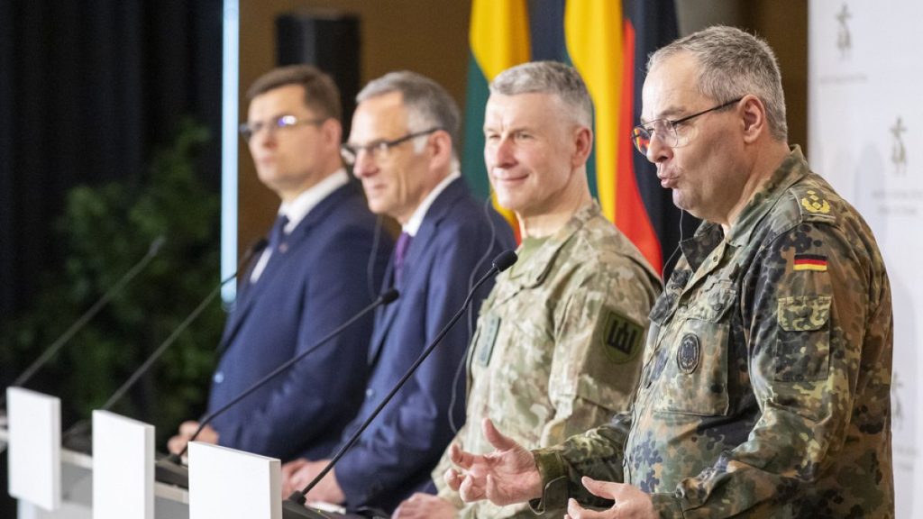 German Army Chief Lt. Gen. Alfons Mais, right, speaks during a media joint conference with Lithuanian Chief of Defence Gen. Valdemaras Rupsys and Lithuanian Defense Minister.