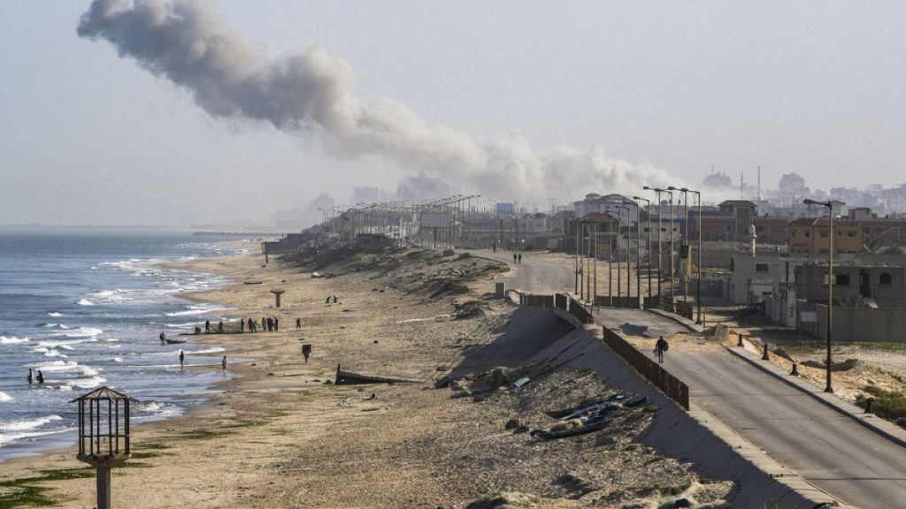 Smoke rises following an Israeli airstrike in the central Gaza Strip, Monday, April 1, 2024.