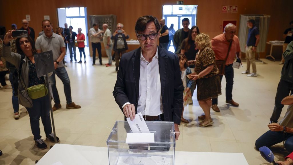 Socialist candidate Salvador Illa casts his vote