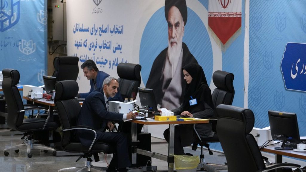 Staff register candidates for the June 28 presidential elections at the Interior Ministry in Tehran, Iran,