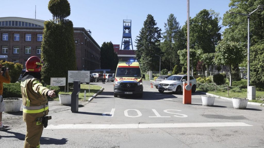 An ambulance is leaving the Myslowice-Wesola coal mine in Myslowice, southern Poland, Tuesday, May 14, 2024