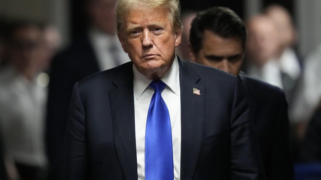 Former President Donald Trump walks to make comments to members of the media after a jury convicted him of felony crimes