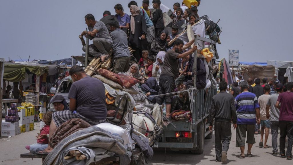 Palestinians fleeing from the southern Gaza city of Rafah during an Israeli ground and air offensive in the city on Tuesday, May 28, 2024.