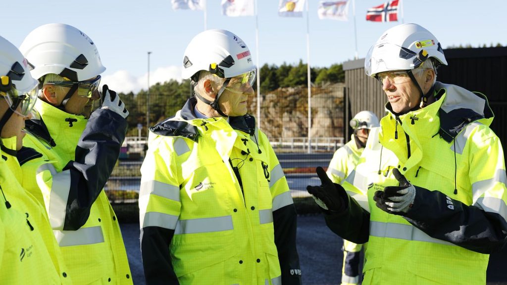 Norwegian Prime Minister Jonas Gahr Støre (centre) tours the Northern Lights CCS project site in 2022 after opening a visitor centre.