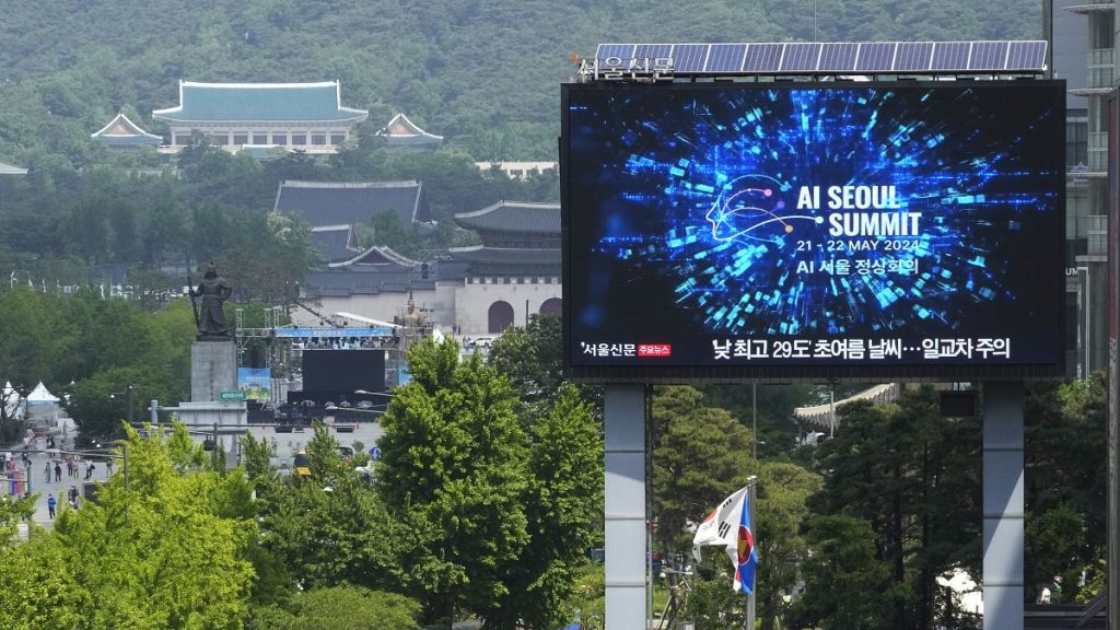 A screen shows an announcement of the AI Seoul Summit in Seoul, South Korea.