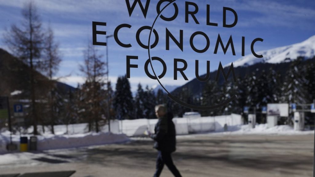 The the logo of the World Economic Forum displayed on a window at the Congress Center in Davos, Switzerland, Sunday, Jan. 14, 2024.