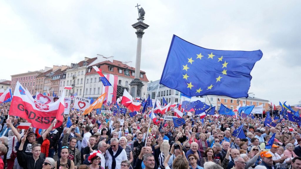 Thousands of supporters of the pro-European Union Poland government listen to Prime Minister Donald Tusk speaking during a rally in Warsaw, Poland, Tuesday June 4, 2024.