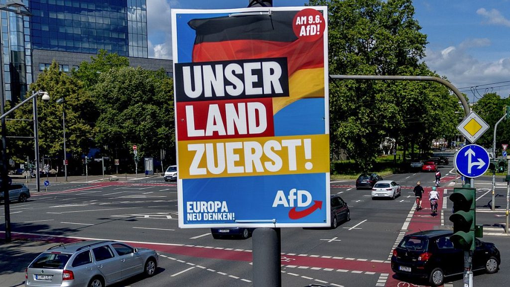 An election poster of German far right AfD party is fixed on a lamp pole in Frankfurt, Germany