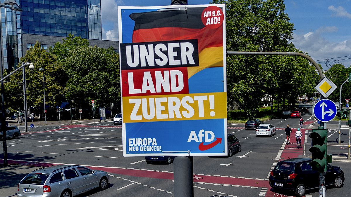 An election poster of German far right AfD party is fixed on a lamp pole in Frankfurt, Germany