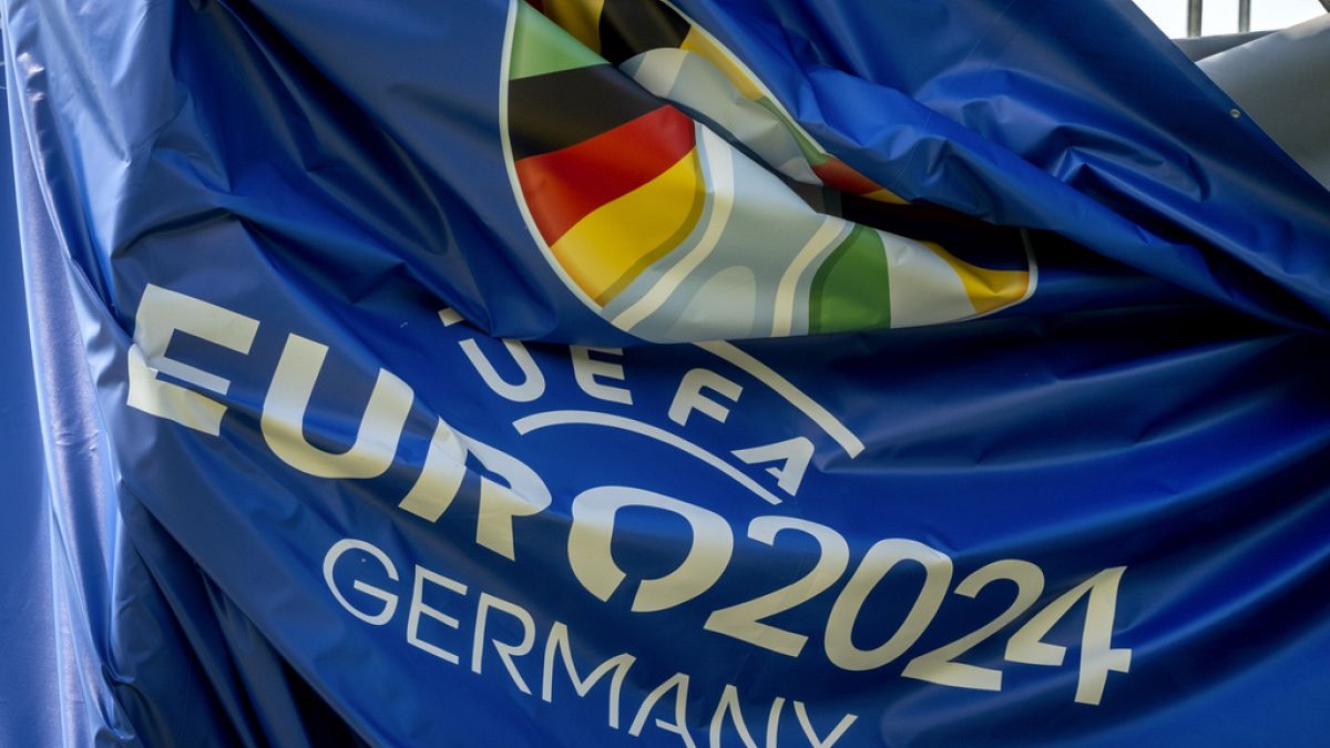 A tarp showing the logo of the Euro 2024 is pictured in the fan zone at the river Main in Frankfurt, Germany, Friday, June 7, 2024