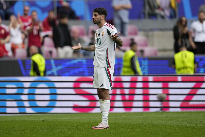 Le Hongrois Dominik Szoboszlai réagit à la fin d'un match du Groupe A entre la Hongrie et la Suisse à Cologne, le 15 juin 2024.