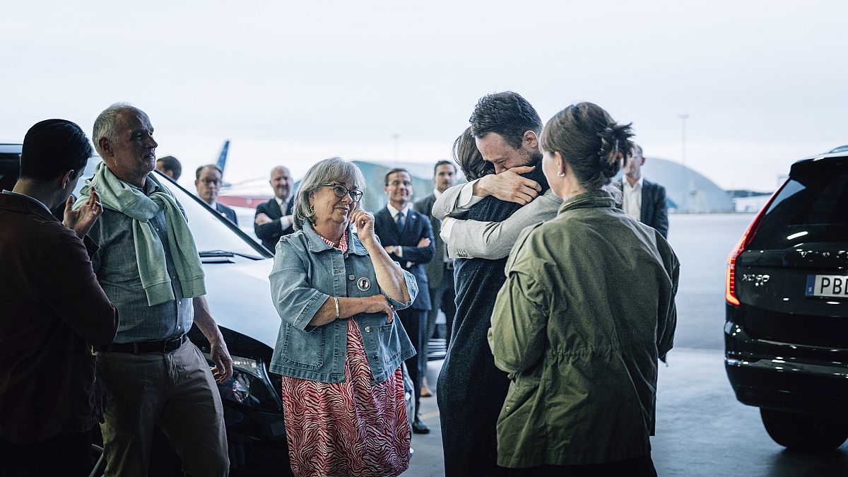 Johan Floderus reunites with his family at Arlanda airport in Stockholm, June 15, 2024