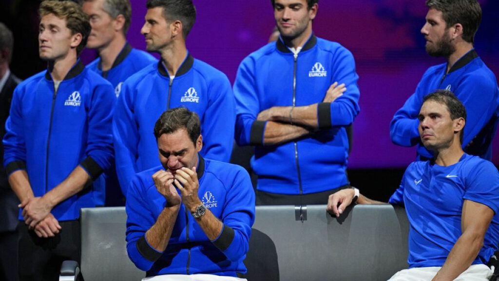 An emotional Roger Federer, left, of Team Europe sits alongside Rafael Nadal after their Laver Cup doubles match against Team World.