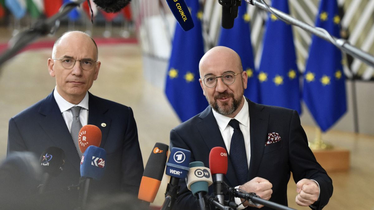 Author of the High-Level Report on the future of the Single Market Enrico Letta, left, and European Council President Charles Michel speak with the media as they arrive for an