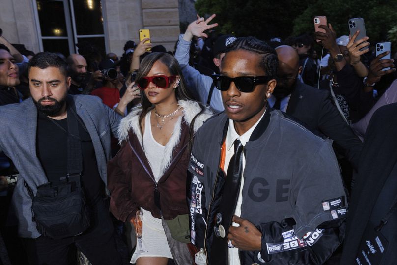   Rihanna, à gauche, et A$AP Rocky au départ de la collection American Sabotage Printemps Été 2025 présentée le 21 juin 2024 à Paris. 