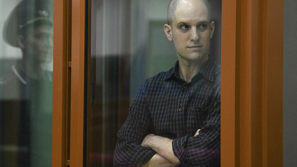 Evan Gershkovich in a courtroom in Yekaterinburg, Russia.